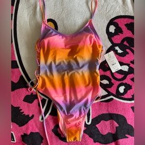 Pink and orange rainbow tie-dye one piece swimsuit size L never worn